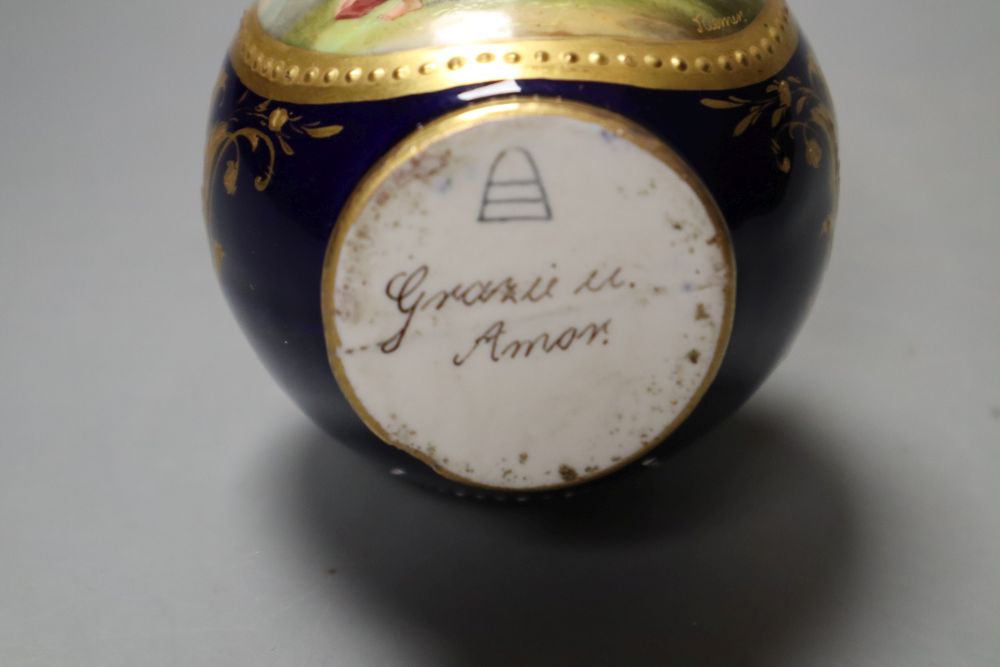 A Vienna vase painted with a woman and children on a blue and gilt ground, 14cm